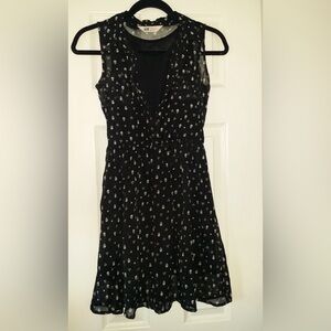 girls h&m black sheer sleeveless flowy dress.